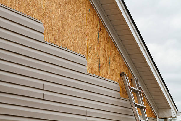 Professional Vinyl Siding technician working in Halifax, PA